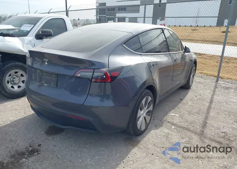 2023 Tesla Model Y Rwd из США, поврежденный, VIN 7SAYGDED9PF958702